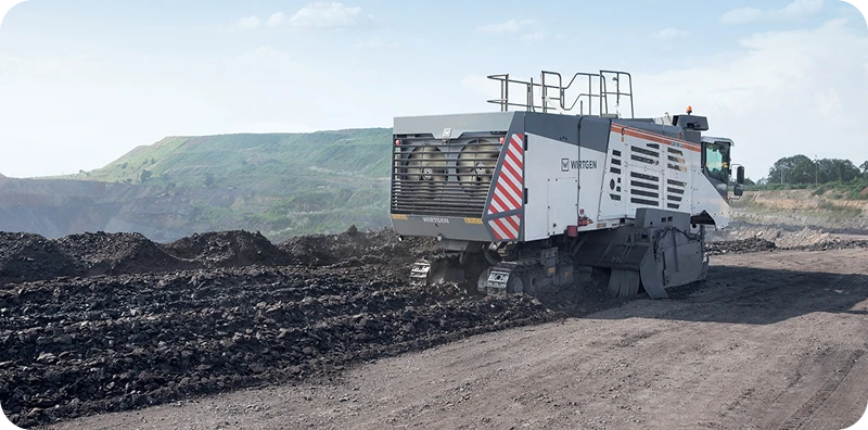 Road milling machine working a construction site